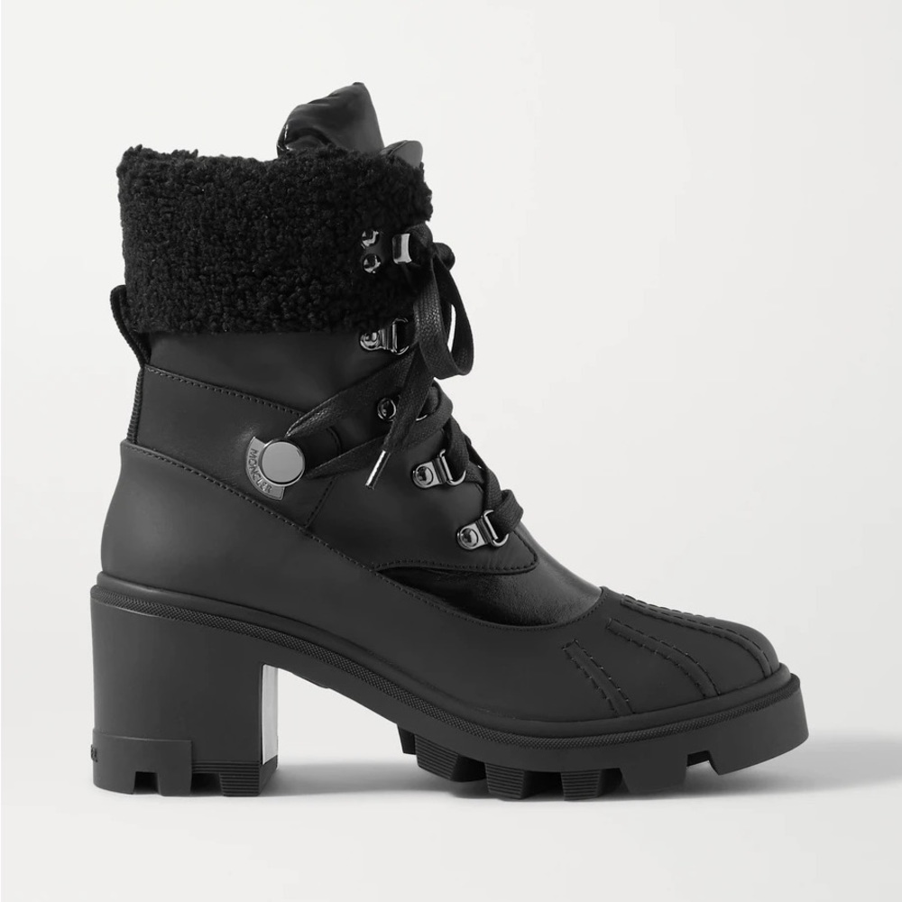 MONCLER
Corinne leather and faux shearling-trimmed rubber ankle boots IT38.5